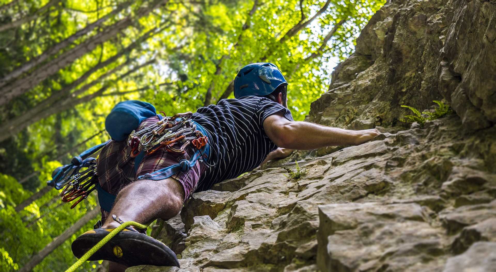climber climbing rock face